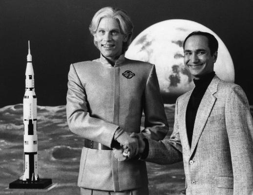 As Dr. Ramdas with John Malkovich in Making Mr. Right